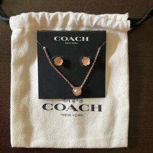 Coach, NWT, necklace and Tea Rose earring set.